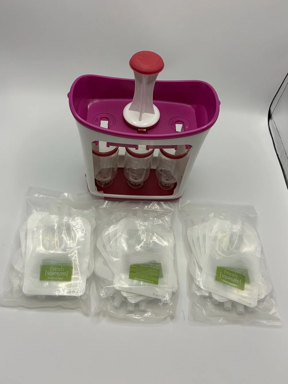 Fresh Squeezed Baby Food Maker and Reusable Pouches in Pink/White with 71 pouche